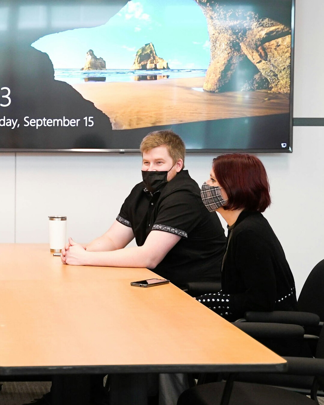person speaking in meeting